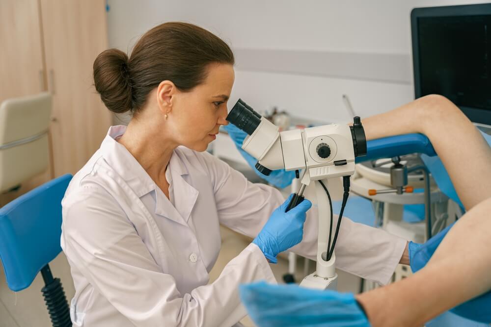 Female Gynecologist Examining Patient