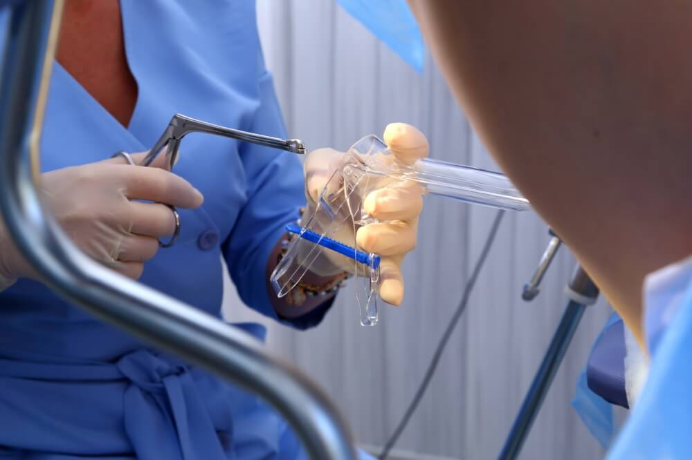 A Gynecologist Performs A Cervical Biopsy Gynecological Chair
