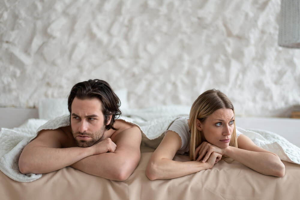 Sexual Problems Relationship Crisis Stressed Young Couple Lying In Bed Overwhelmed With Family Difficulties