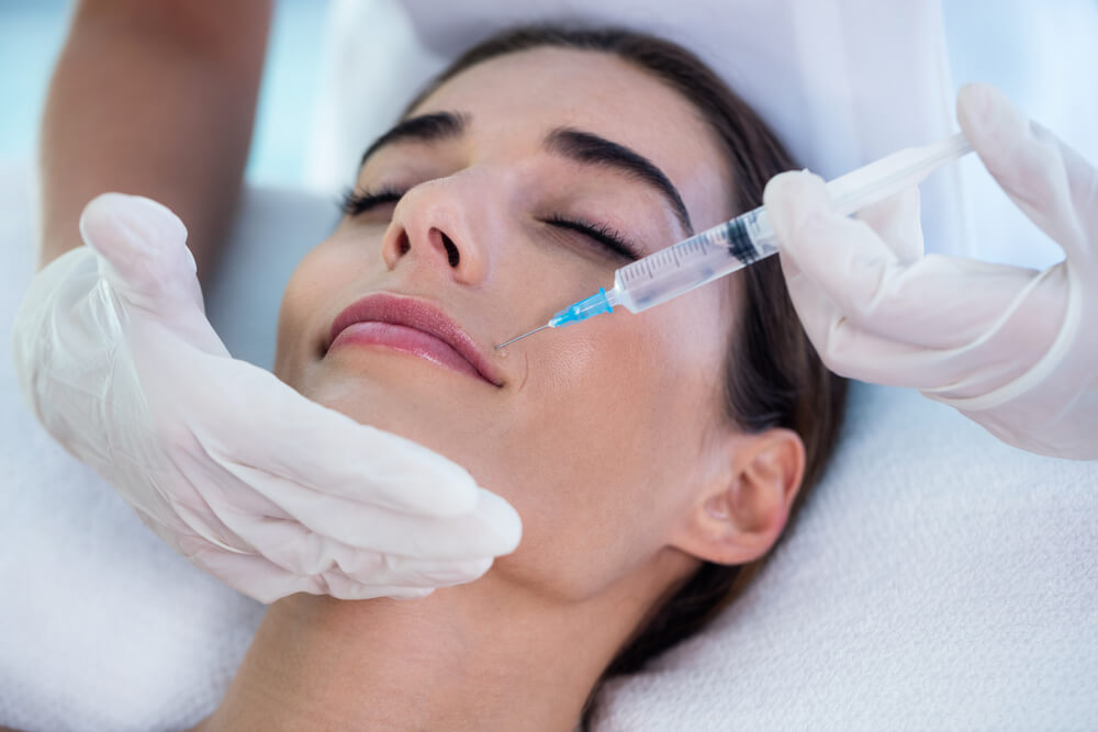 Woman Receiving Botox Injection at Spa