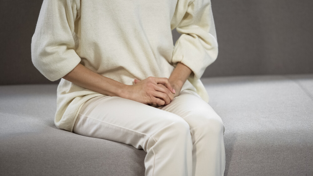 Woman Suffering From Strong Menstrual, Gynecological and Urological Problems