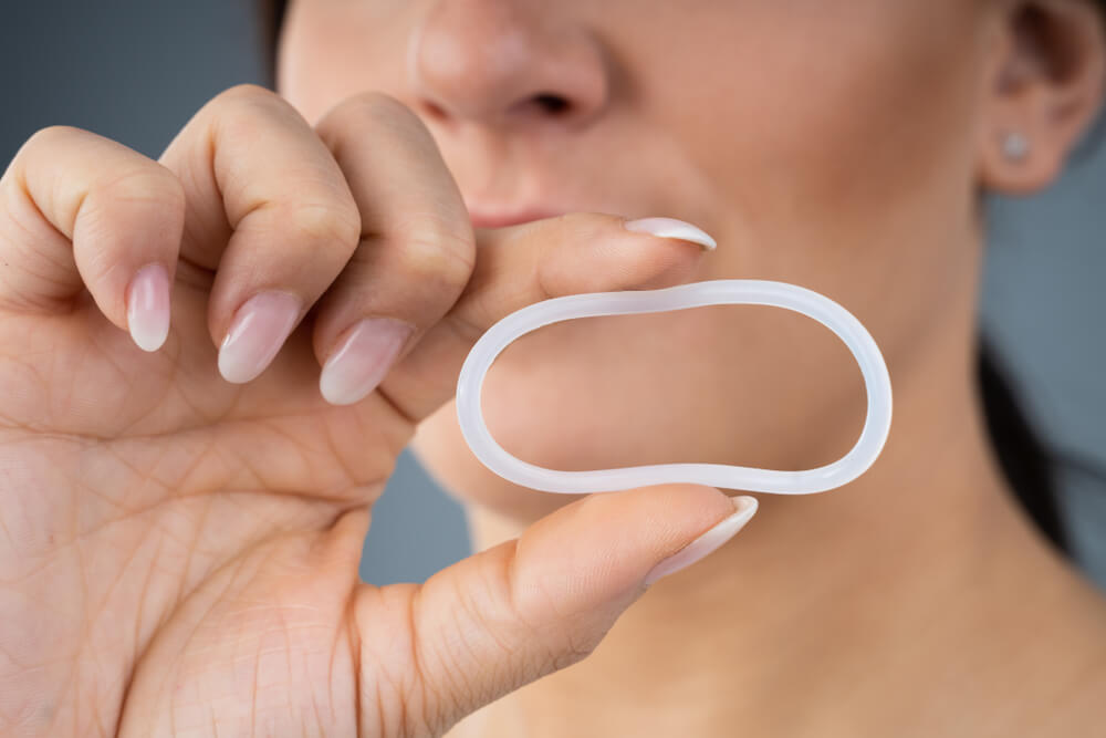 Woman Holding Vaginal Ring For Contraceptive Use