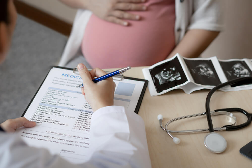 Pregnant Woman Visit Gynecologist Doctor for Pregnancy Consultation