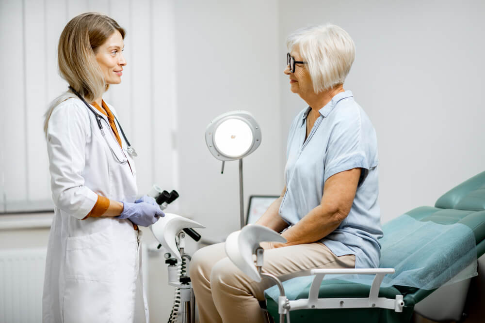 Senior Woman Sitting on the Chair During a Medical Consultation With Gynecologist.
