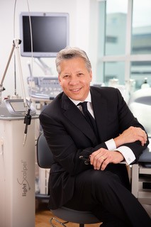 Dr. Sepulveda Posing in His Clinic in a Suit