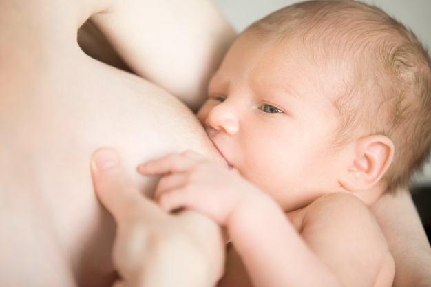 Mother Breastfeeding Her Child