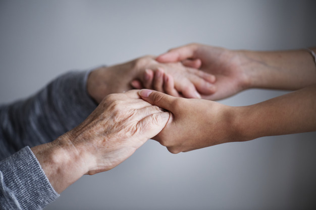 Two Women Holding Their Hands