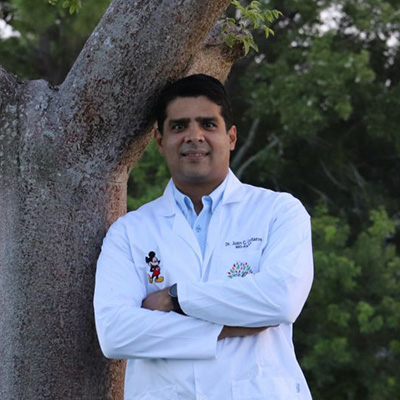 Dr. Juan Collazos, MD, FAAP.
