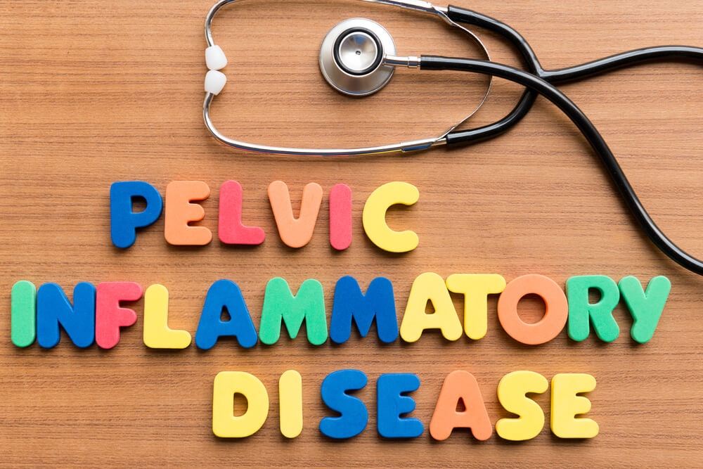 Pelvic Inflammatory Disease Colorful Word on the Wooden Background