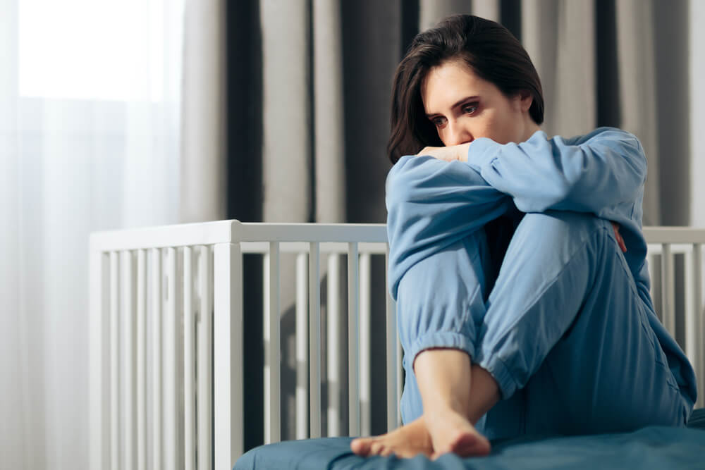 Unhappy Woman Suffering From Postpartum Depression