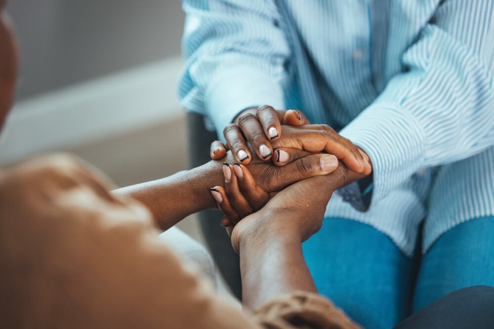 African-American-Family-Couple-Holding-Hands-Husband-Showing-Support.