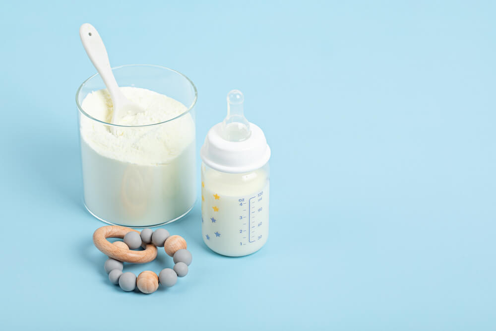 Preparation of Formula for Baby Feeding. Baby Health Care, Organic Mixture of Dry Milk Concept