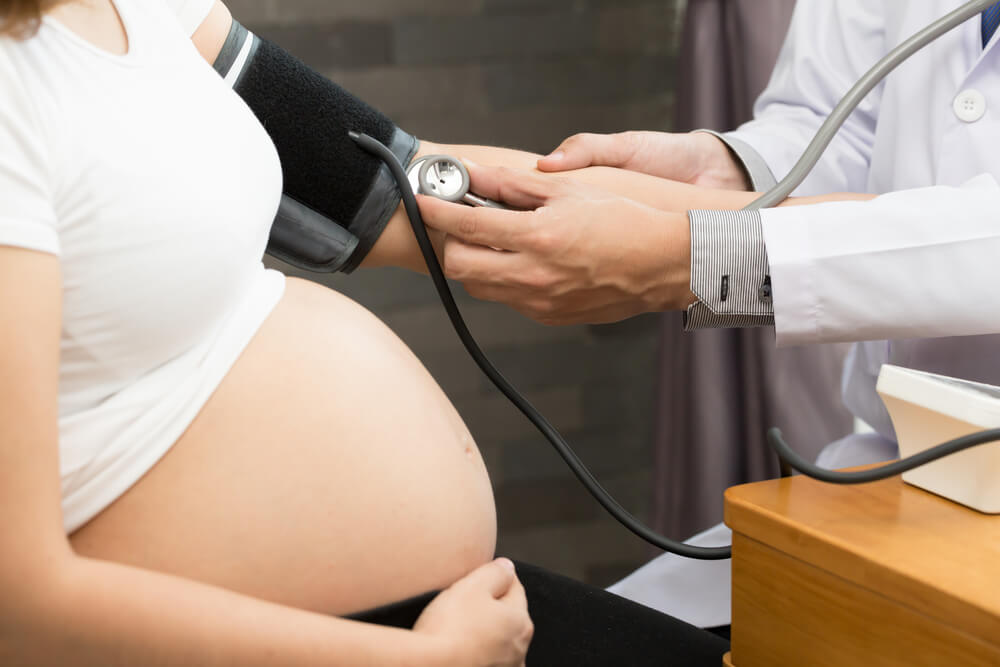 Doctor Is Checking The Blood Pressure Of Pregnant Women