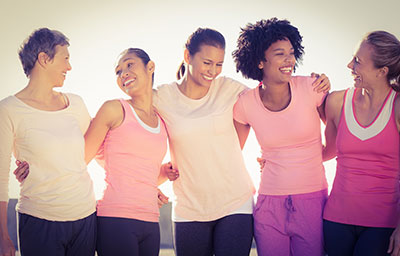 Five Smiling Women Hugging Each Other