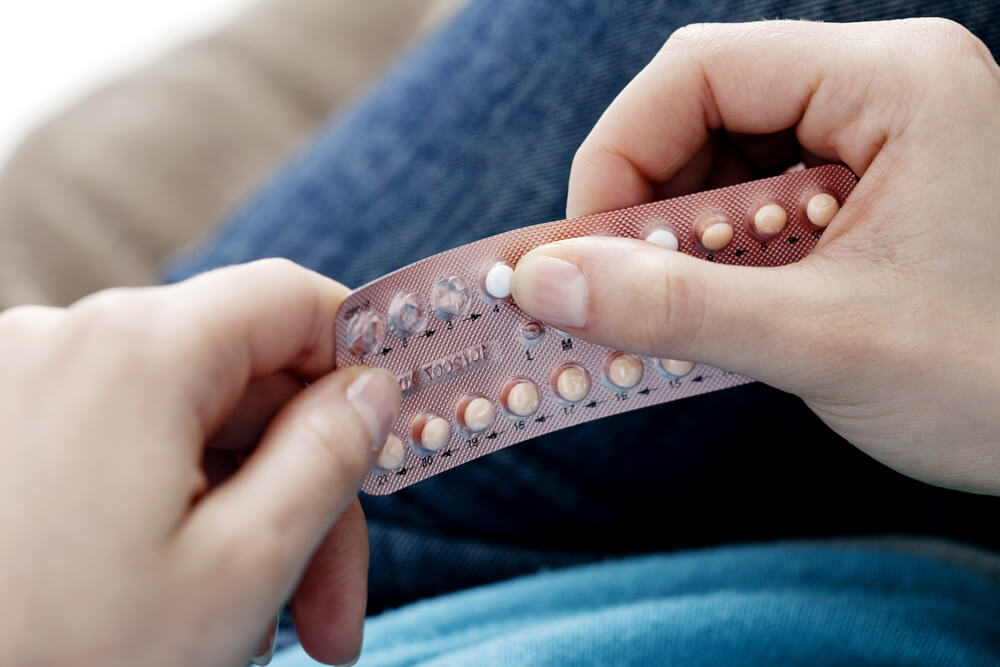 Woman Using Contraceptive Pill