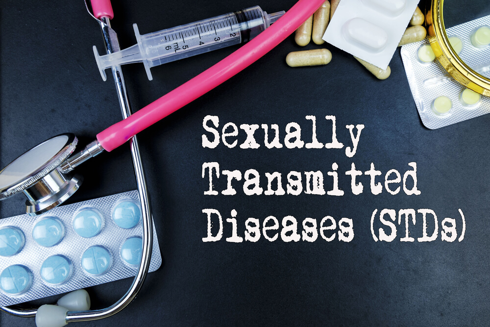 Sexually Transmitted Diseases (Stds) Word, Medical Term Word With Medical Concepts in Blackboard and Medical Equipment