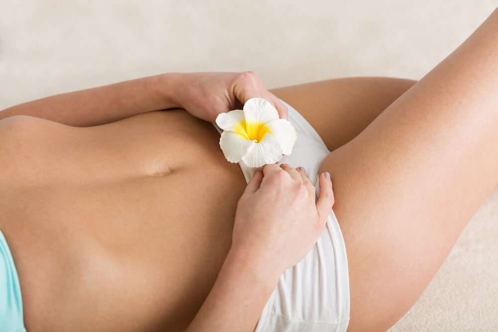 Beautiful Woman With Flower on Her Vagina