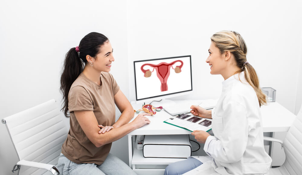 Consultation of a Gynecologist, Doctor and Woman Patient Is Talking in a Gynecological Office.
