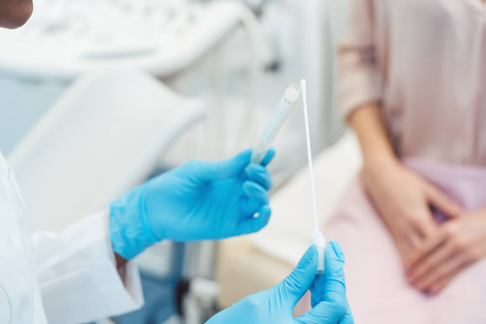 Gynecologist Testing Vaginal Swab for STD