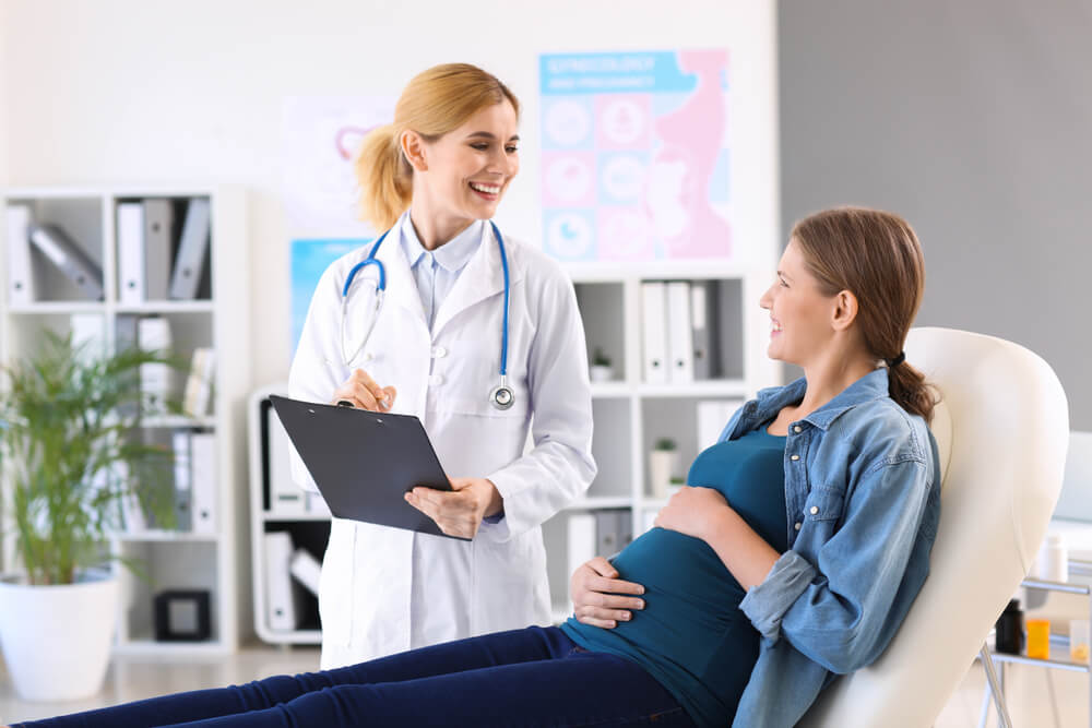 Young Pregnant Woman Visiting Her Gynecologist in Clinic