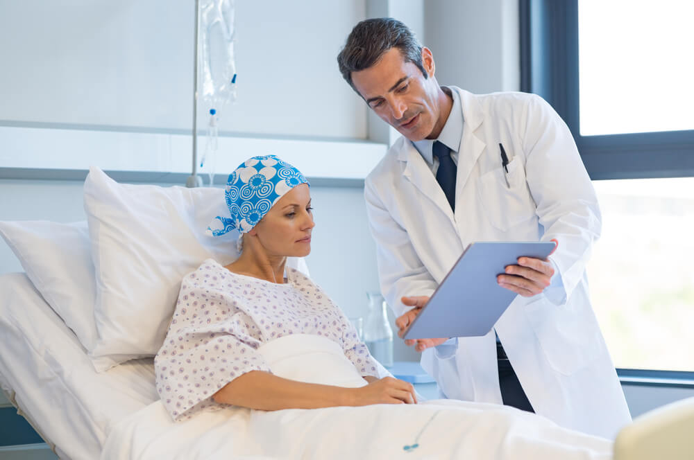 Doctor Telling to Patient Woman the Results of Her Medical Tests.