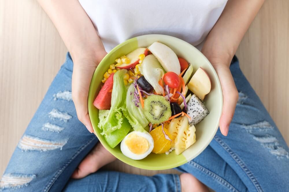 Fresh Vegetable Salad and Healthy Food With Fruit, Vegetables, Pulses, Herbs.