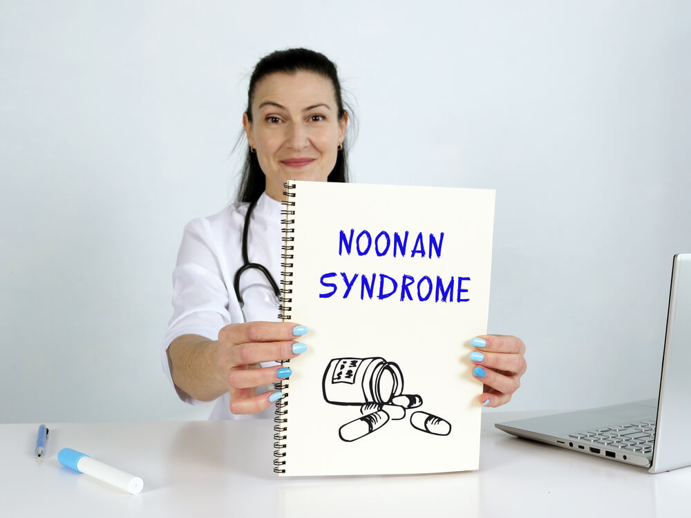 Oncologist Hands Holding Noonan Syndrome Inscription on the Screen