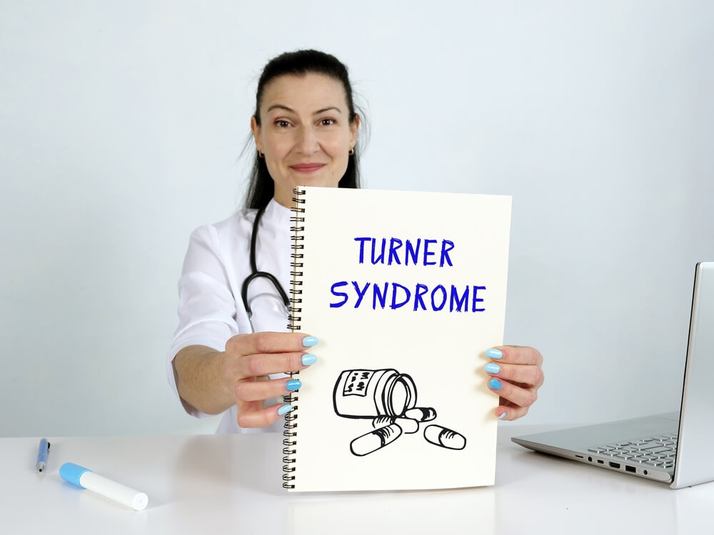 Doctor Holding a White Paper With Turner Syndrome Written on It