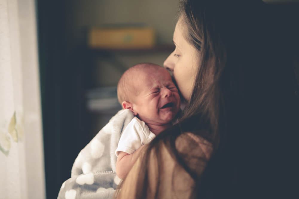 Baby Crying In Mother Hand