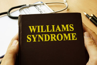 Book With Title Williams Syndrome on a Table.