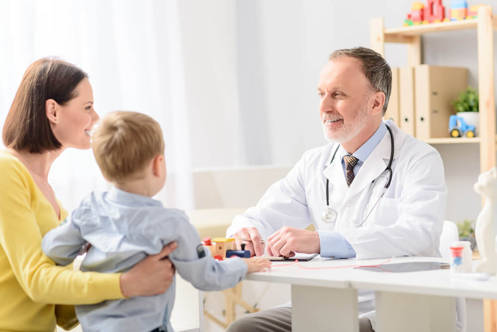 Little Boy With His Mother at Pediatrician on Consultation