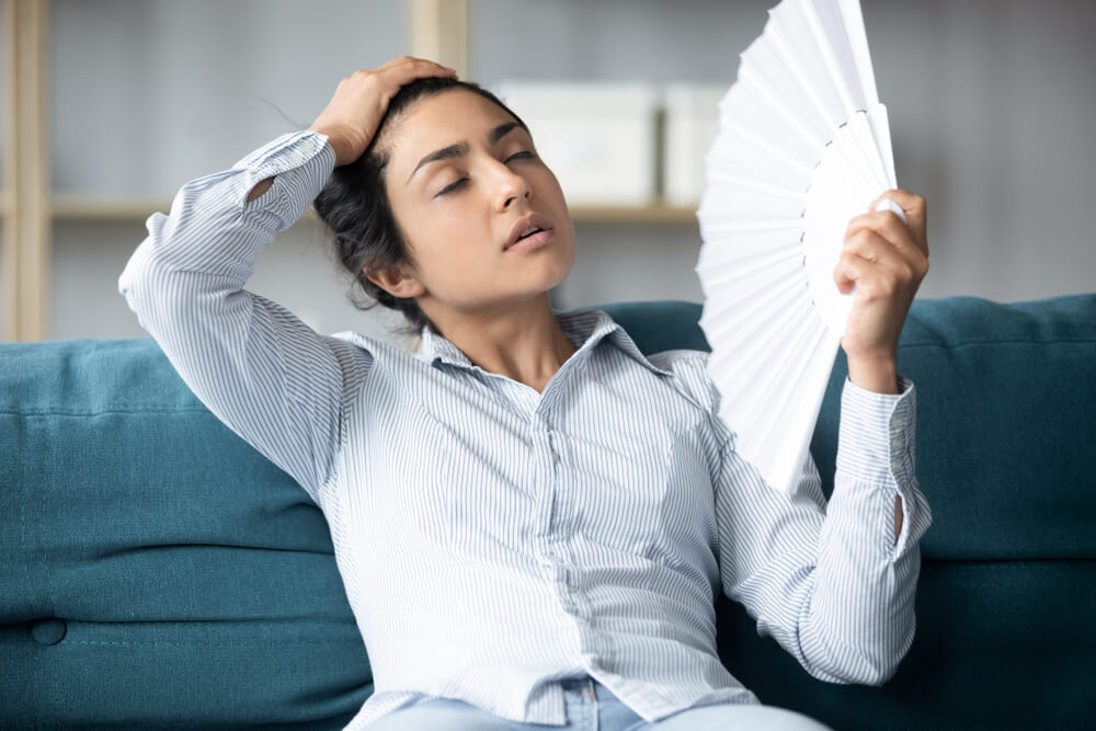 Woman Suffering From Heat