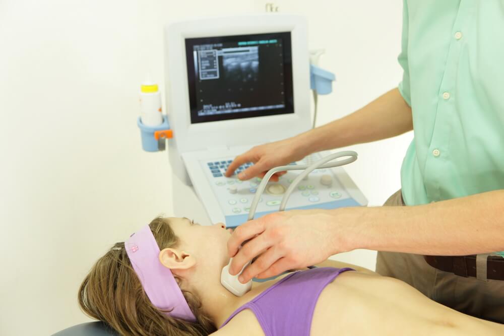 Girl’s Neck Diagnosis Carried Out With the Use of an Ultrasound