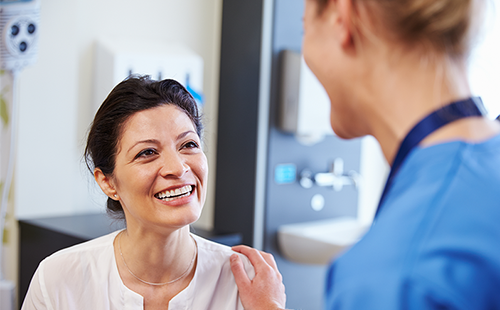 doctor with smiling patient