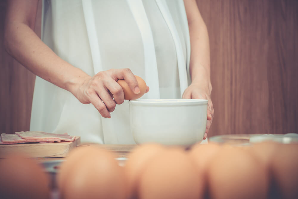 Pregnant Woman Prepares Eggs