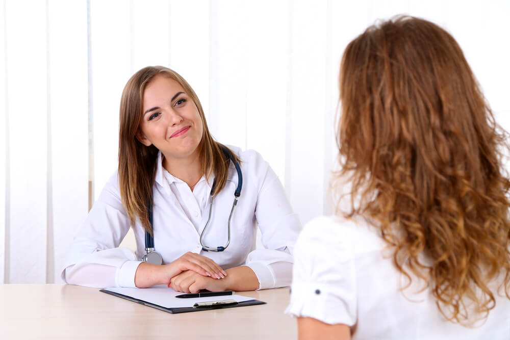 Doctor and Patient Talking at the Office