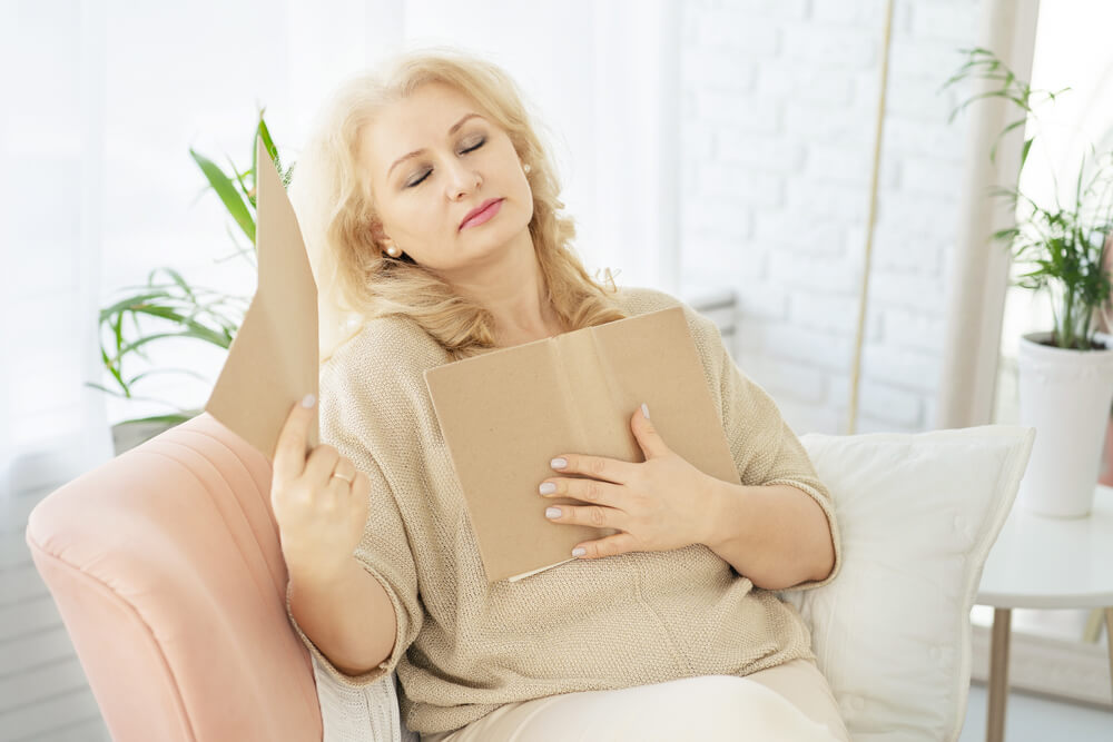 A Middle-Aged Woman Woman Feels Bad Because of Menopause.