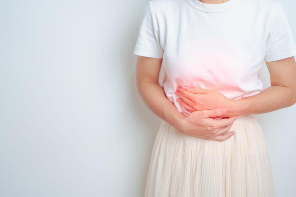 Woman having abdomen pain.