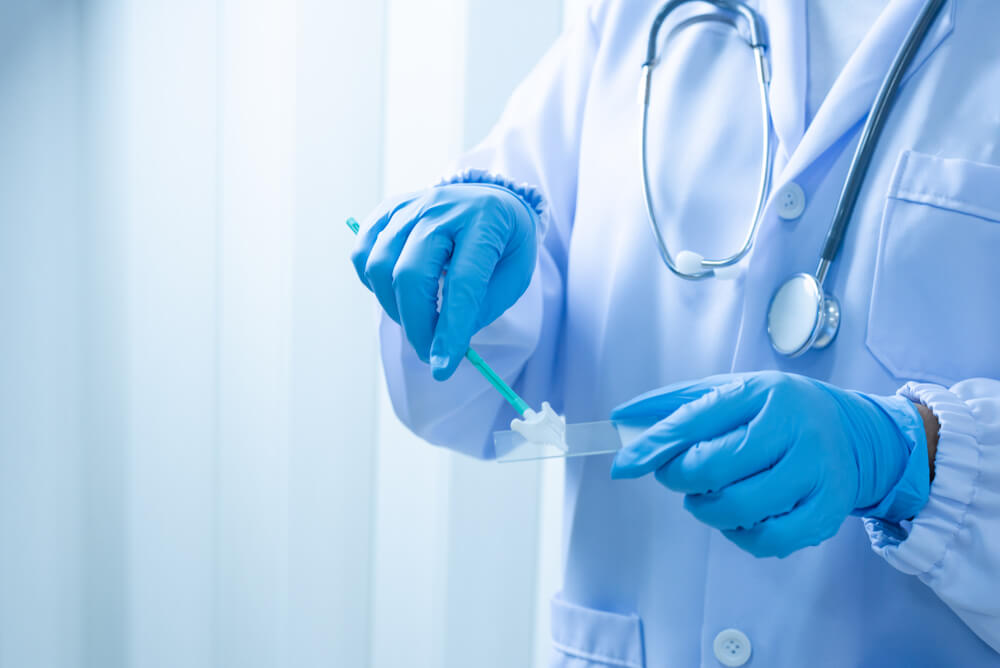 Gynecologist Working for Vaginal and Cervix Pap Smear Patient in the Obstetrics and Gynecology Department.