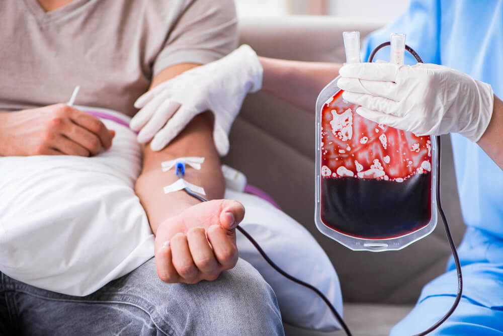 Patient Getting Blood Transfusion in Hospital Clinic