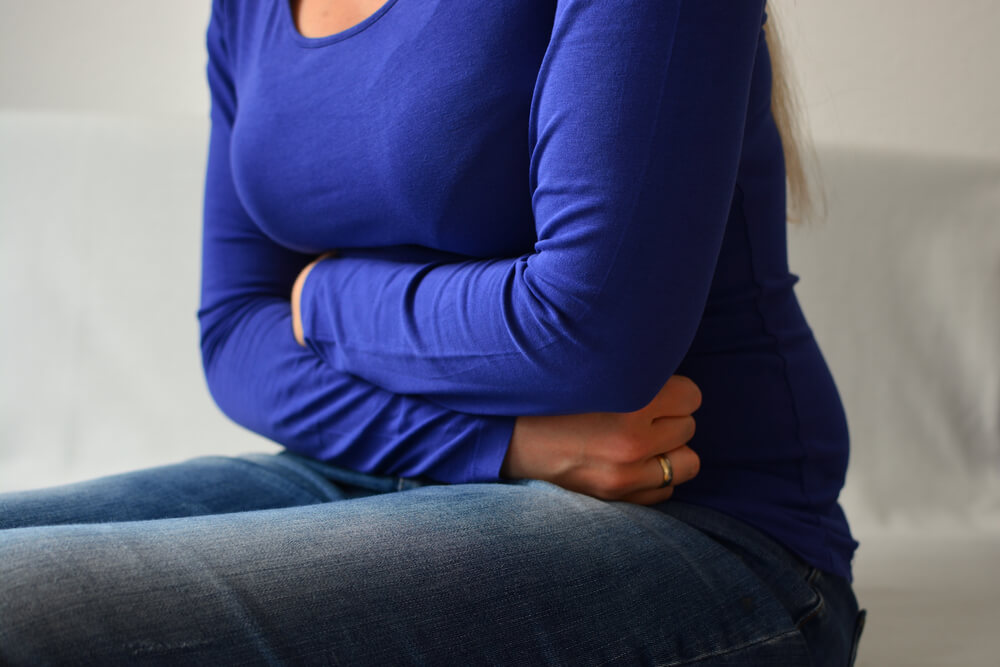 Close-up of Woman Suffering From Stomach Ache