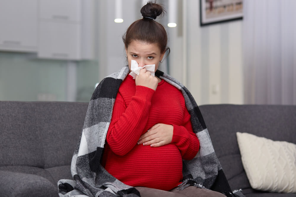 Photo of Young Pregnant Woman Has Seasonal Disease Caught Cold During Winter