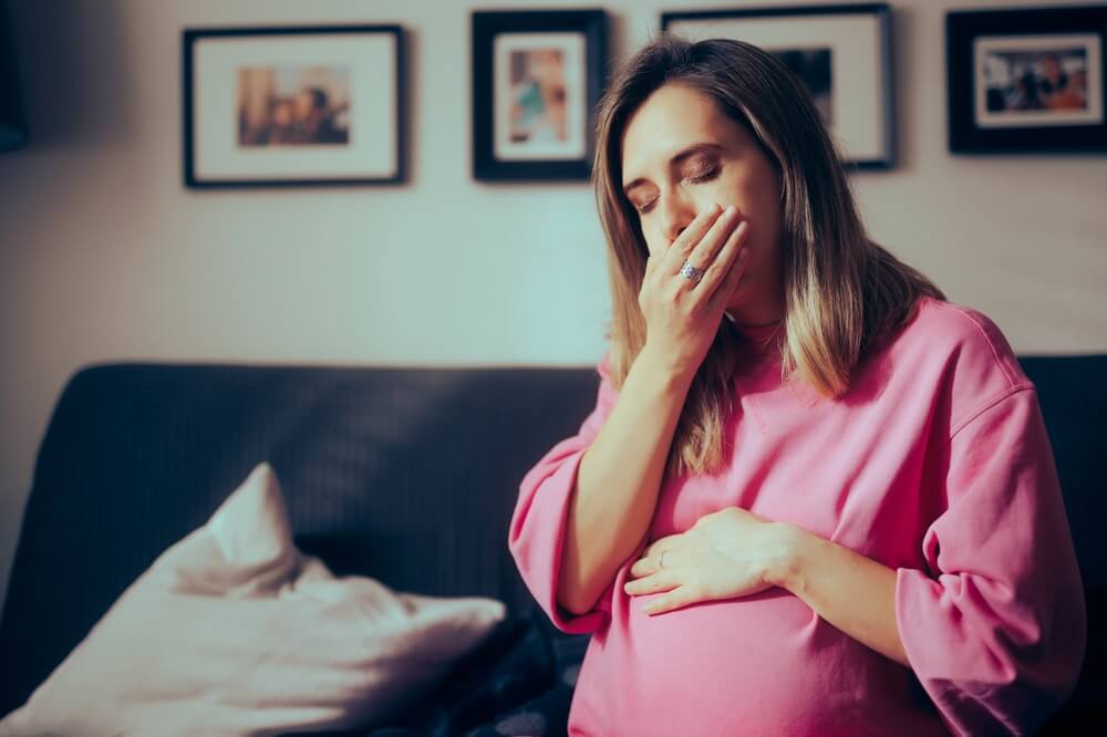 Pregnant Woman In Her Third Trimester Feeling Sick At Home Mother To Be Suffering From Morning Sickness Late Into Her Pregnancy