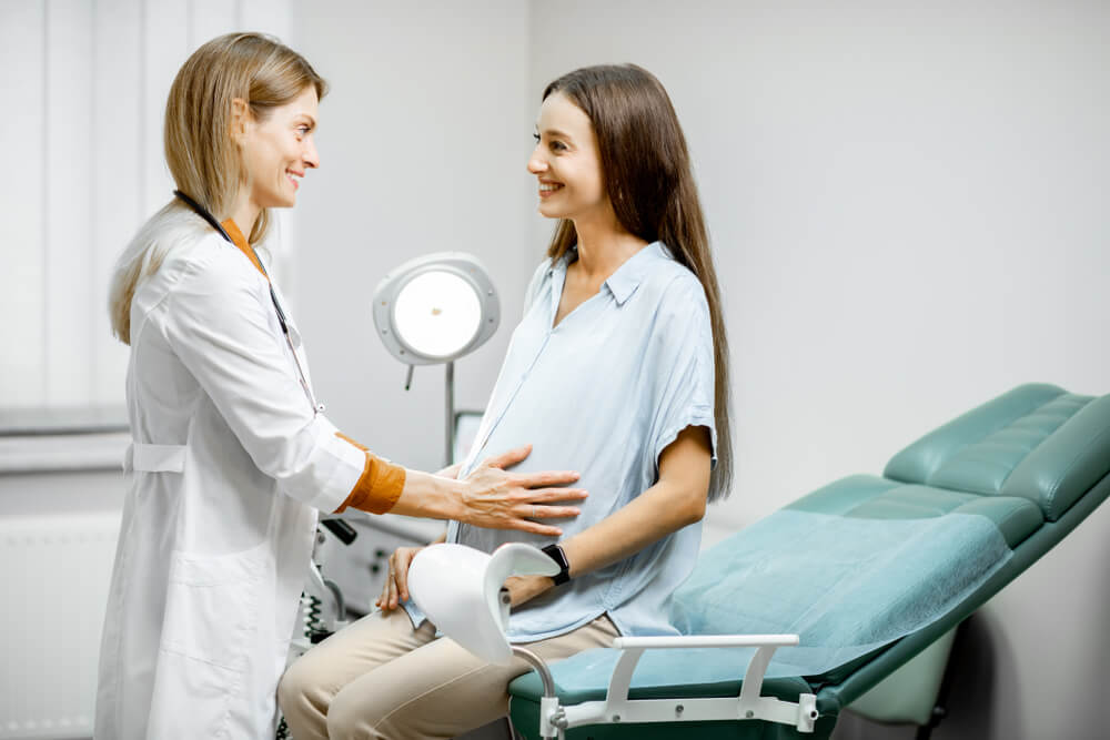 gynecologist examining patient