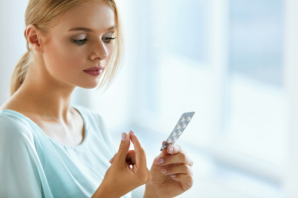 Woman Taking Medicine