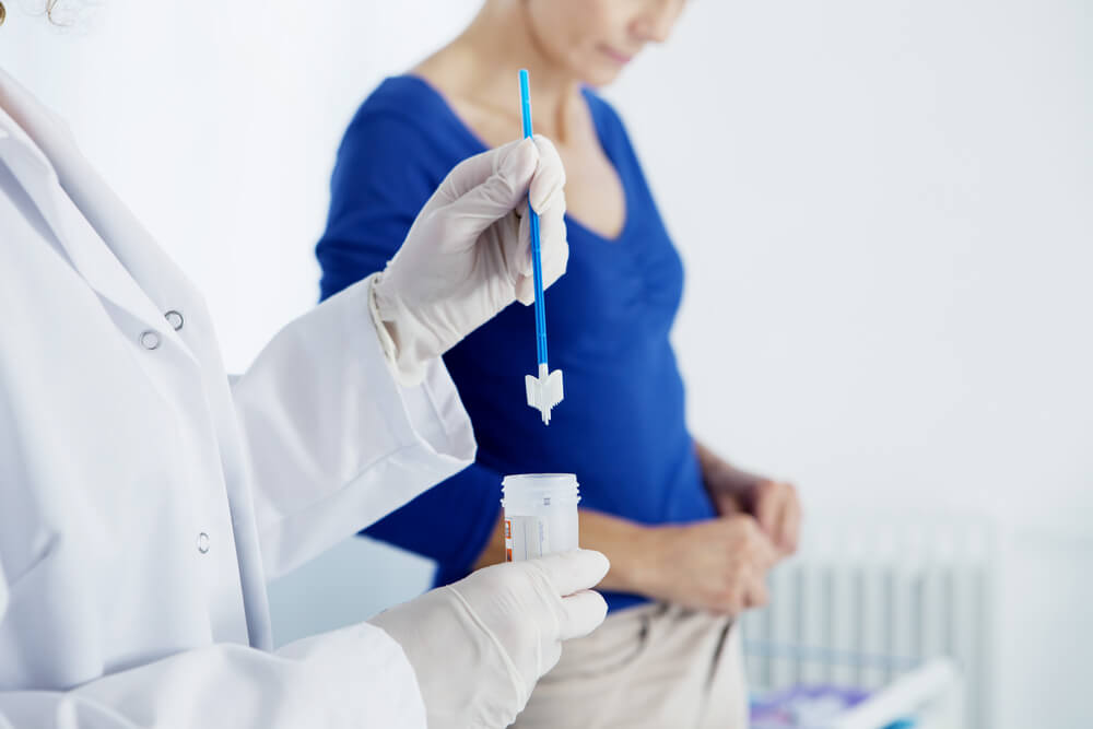 Doctor Performing Pap Smear