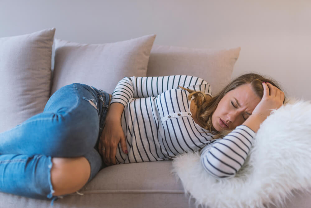 Young Beautiful Woman Having Painful Stomachache.