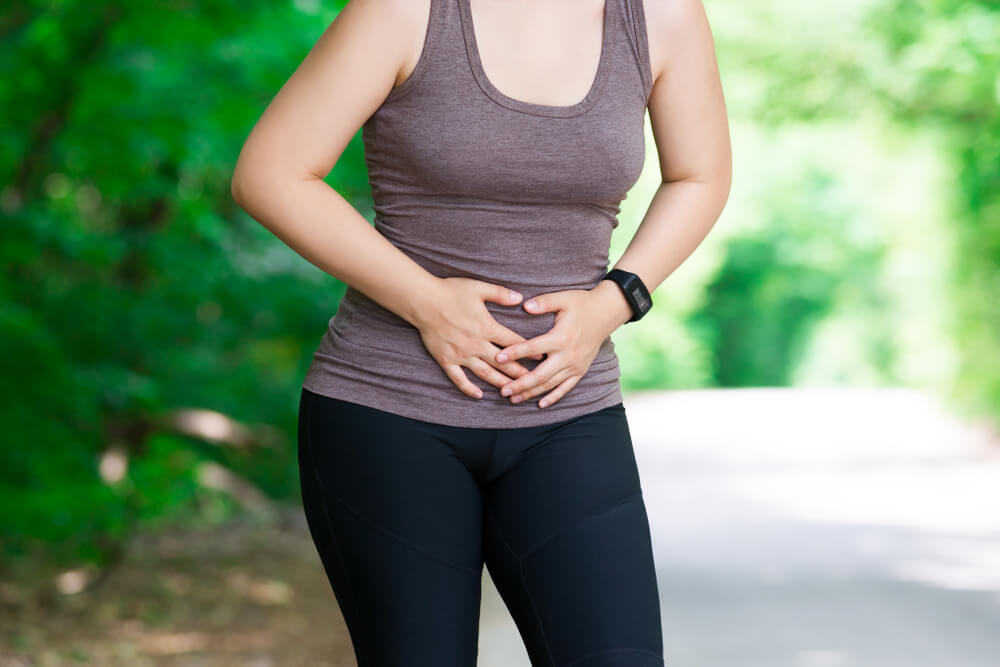 Woman With Abdominal Pain Outdoor