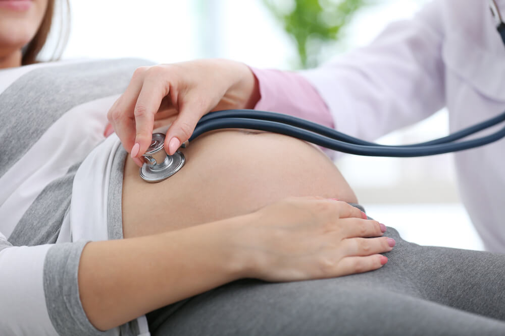 Doctor Examining a Pregnant Woman