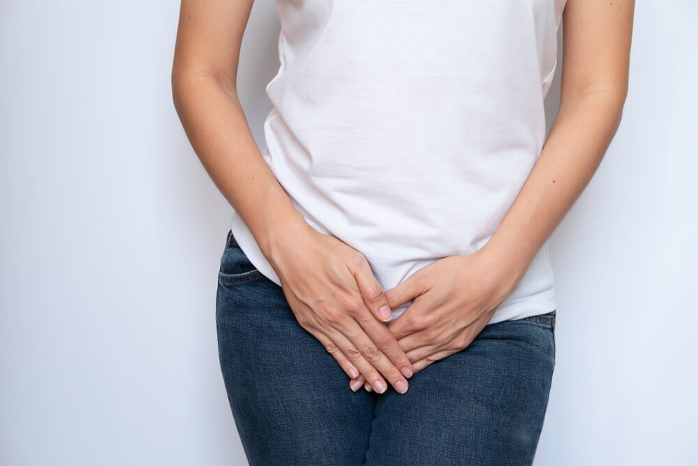 Woman Hands on Crotch Suffering From Itchiness and Soreness.